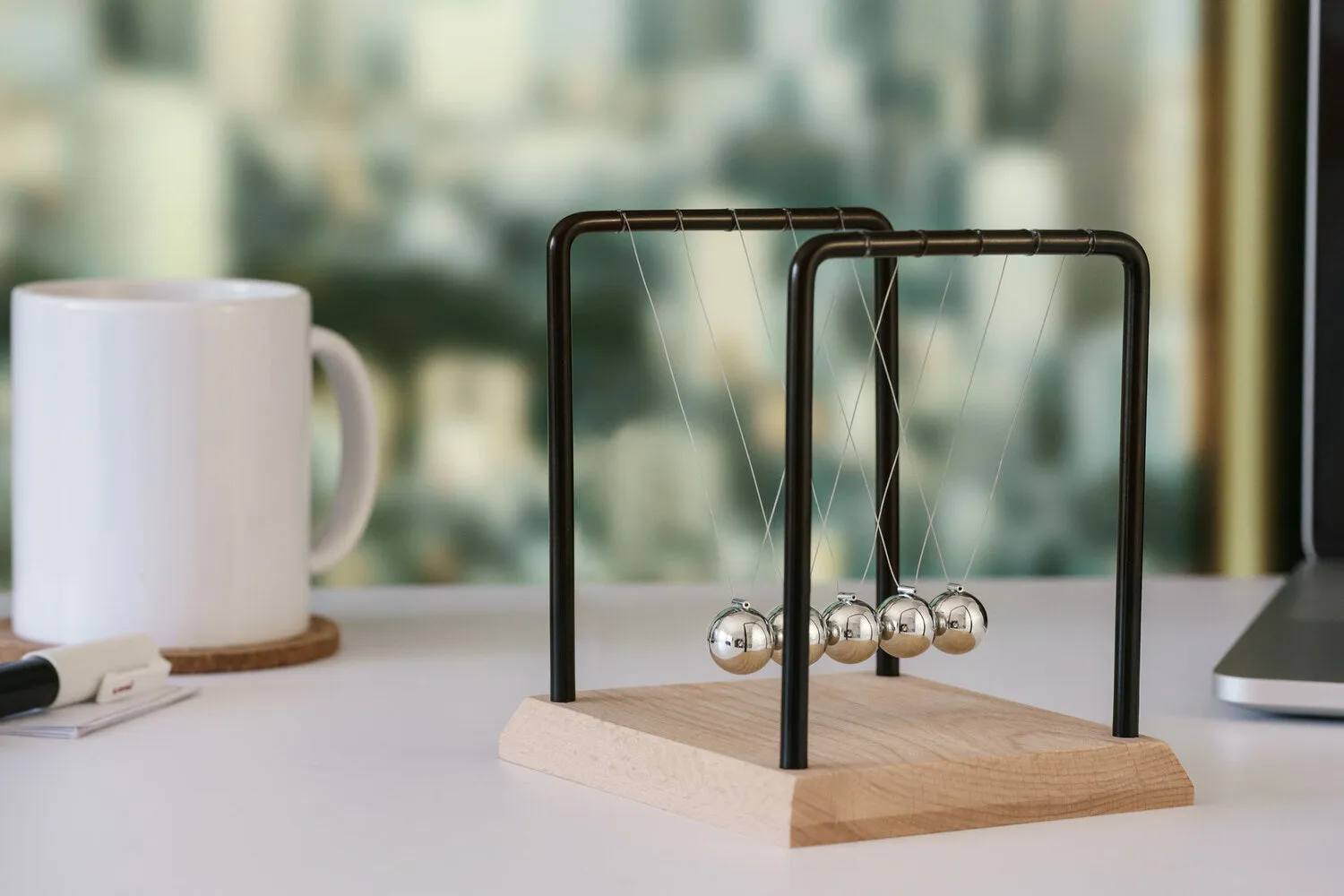 Newtons Cradle with Beach Timber